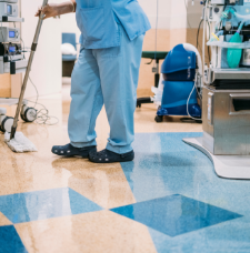 Close up of person mopping the floor